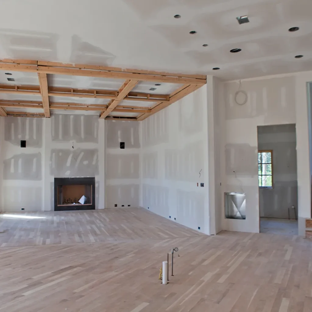 New-build home interior with fresh drywall and hardwood floors ready for post-construction cleaning in Surrey